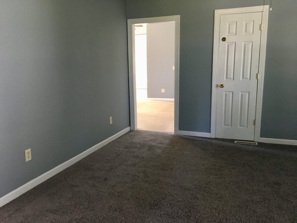 New carpet and restored walls.